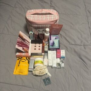 Ulta Beauty Pink Cosmetic Pouch filled with Makeup, Skin and Haircare